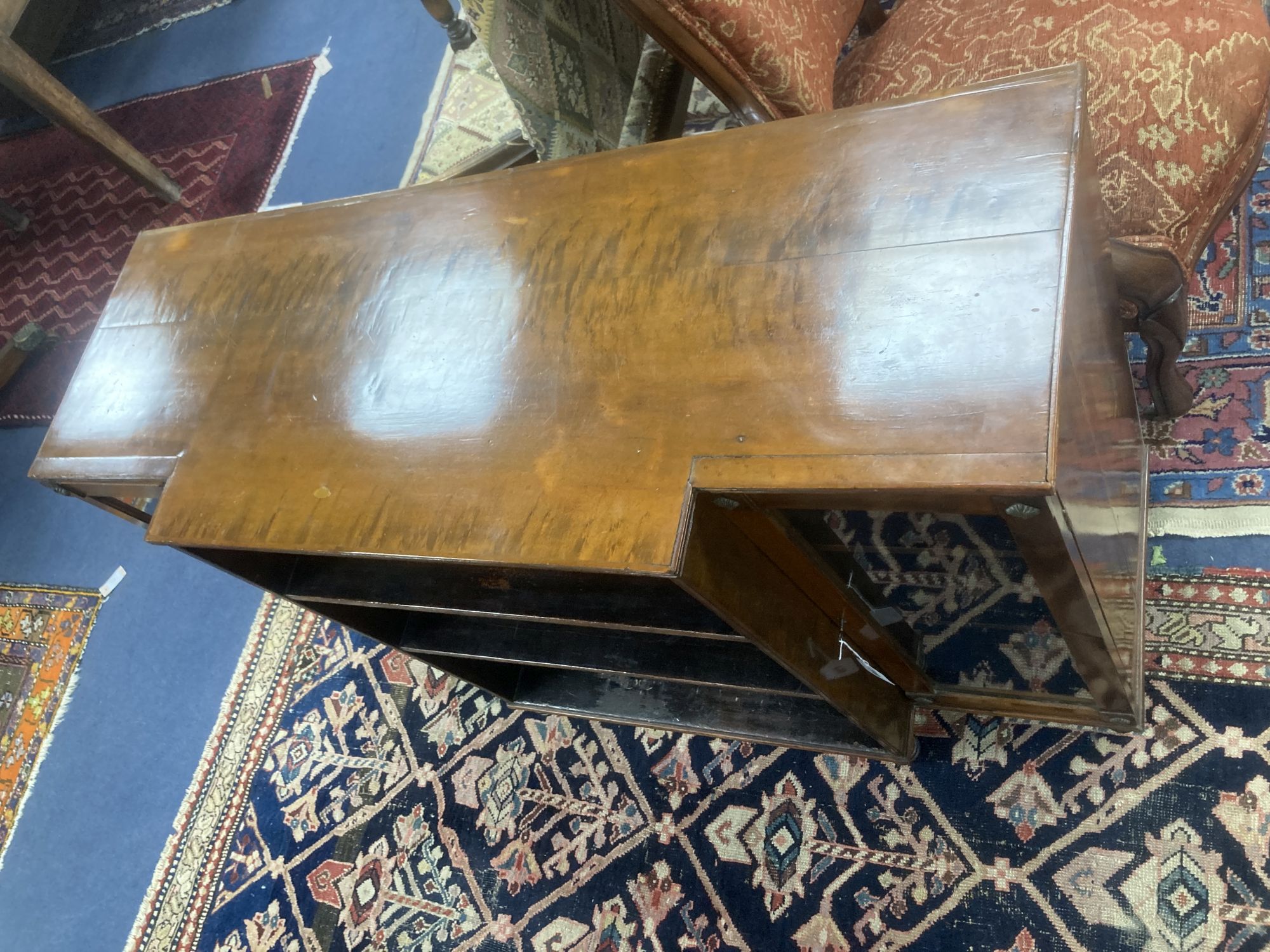 A Regency style mahogany and satinwood dwarf breakfront bookcase, length 112cm, depth 42cm, height 78cm